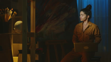 painter using laptop