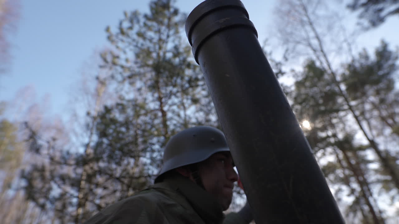 WWII Soldier Loading a Mortar