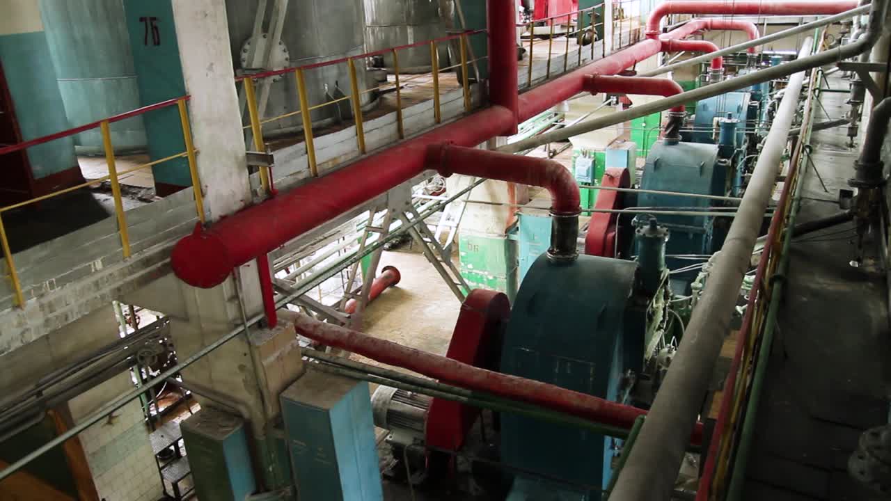 Industrial Plant Interior with Machinery and Pipes