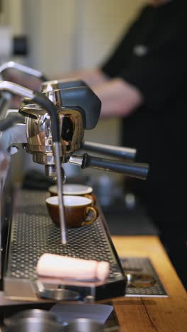 barista making espresso