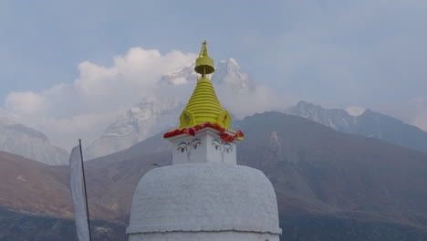 drone shot of dingboche’s buddhist stupa at 4400m. serene himalayas, proud mountains, and nepalese spiritual unity in everest base camp trek route, stunning view religious significance