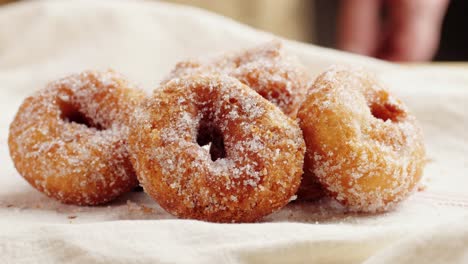 sugary donuts being picked up