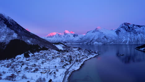 Aerial-shot-of-spectacular-mountains-at-sunset-looking-towards-stortinden-in-Sigerfjord-norway,-drone