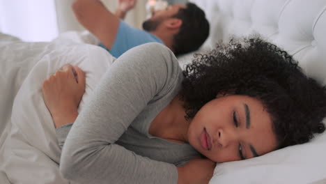 Black-man-and-angry-black-woman-fight-in-bed