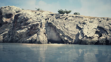 coastal view of a sand beach with cliffs