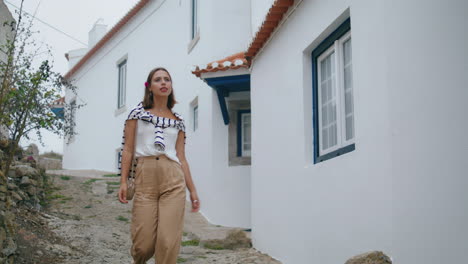 Tourist-girl-walk-street-leaving-shot-vertical.-Pretty-woman-exploring-old-town