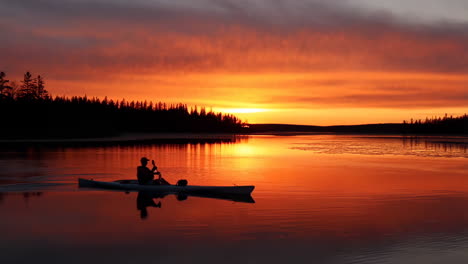 kayaking at sunset on a lake