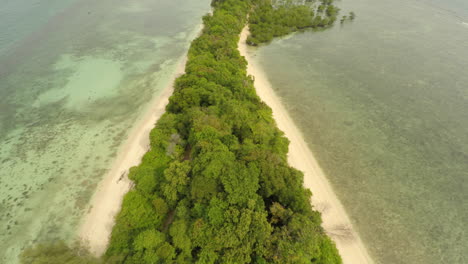 long tropical island undeveloped with beaches and jungle