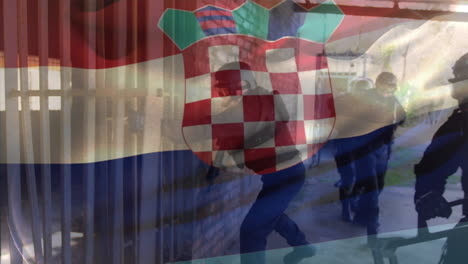 animation of flag of croatia over diverse male counter terrorists with weapon