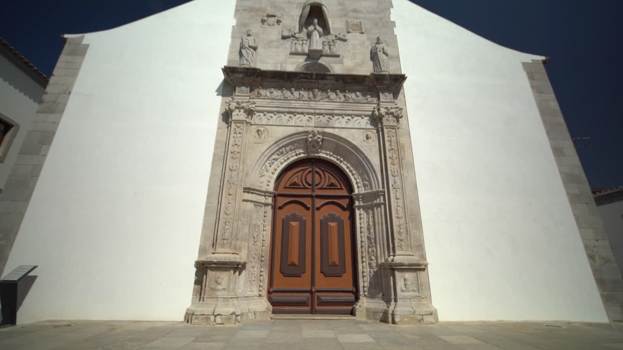 Tavira Algarve Portugal In camera zoom into a church door downtown Tavira. Historic neighborhood