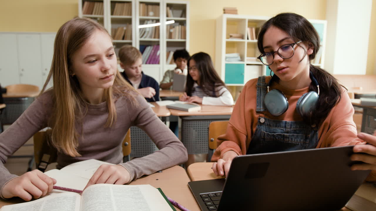 Students studying and collaborating in a school classroom