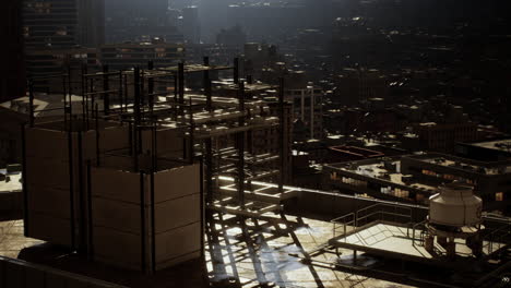 dark city rooftop view at sunset