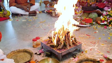 yajna, a ritual done in hindu worship where wood is set on fire with holy oil and ghee