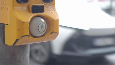 close-up of a pedestrian crosswalk button