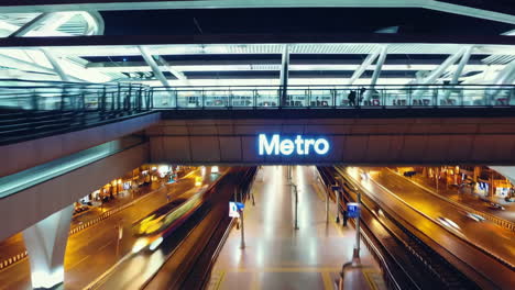 night view of a busy metro station