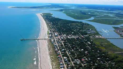 folly beach from air with pier and bridge along peninsula