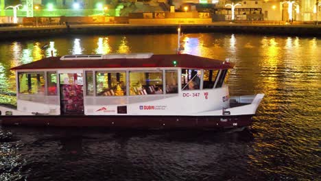 dubai ferry at night