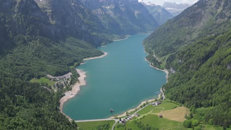 Aerial-shot-of-Klöntalersee-great-lake,-Glarus-Canton,-Switzerland