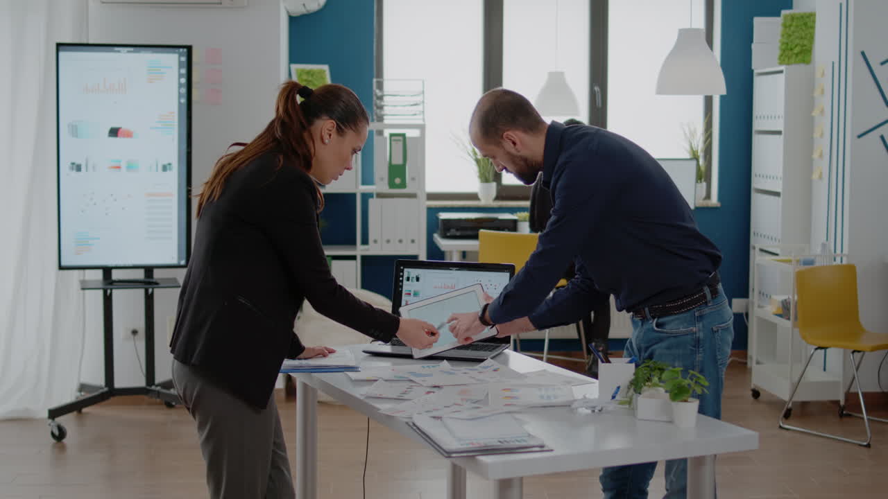 Man and woman doing teamwork for business strategy