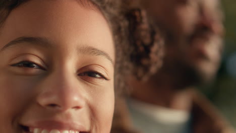 closeup smiling girl looking camera sparkling eyes. relaxing cheerful child.