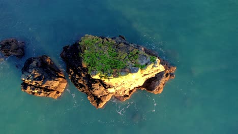 drone looking down on small island on the copper coast waterford ireland