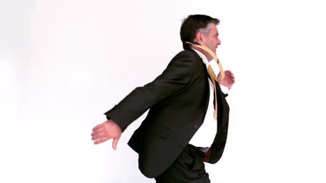 side view of businessman running