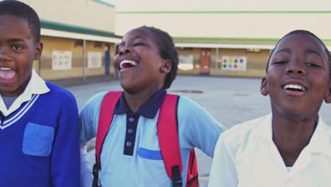 young schoolchildren smiling in playground 4k