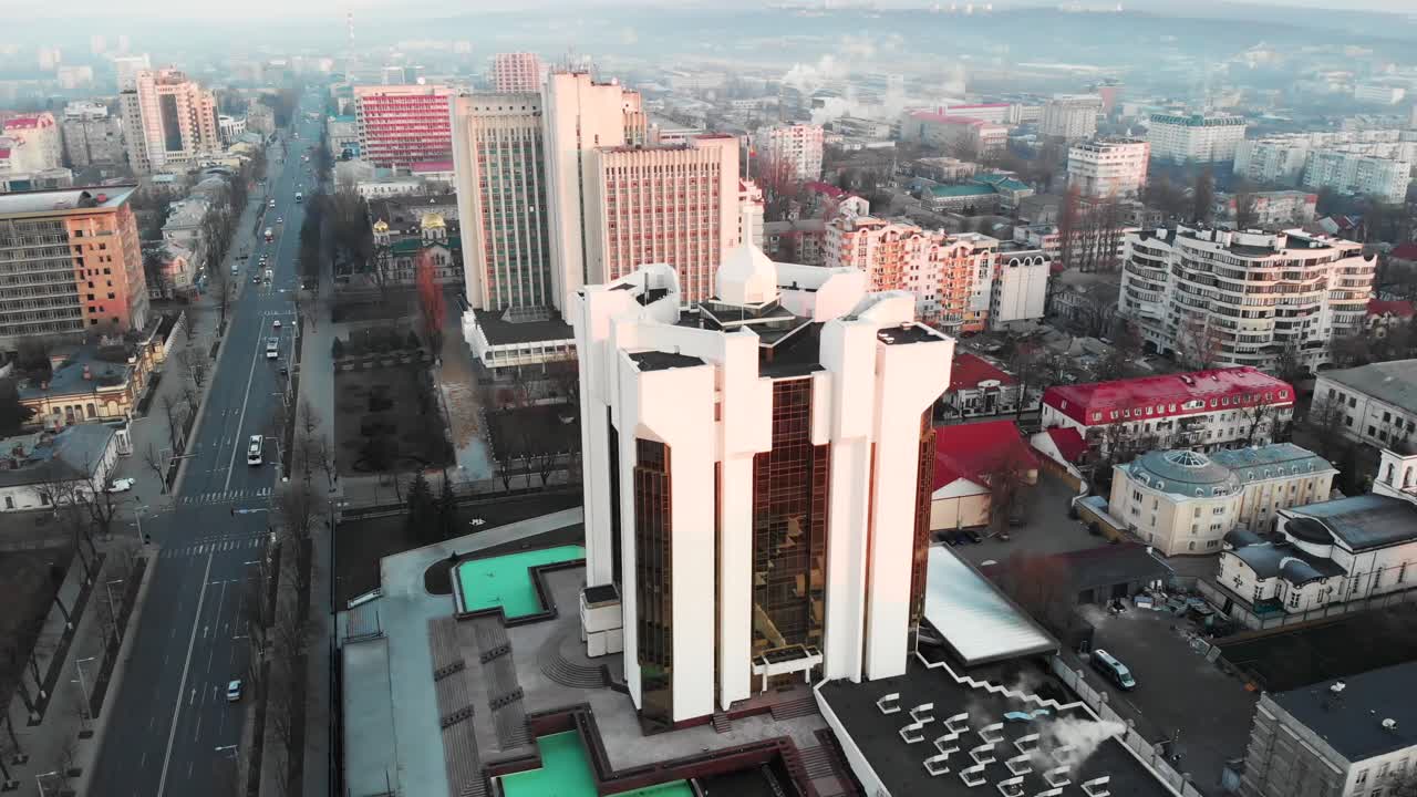 Aerial drone view of presidency building at sunrise. Quick timelapse around. Chisinau, Moldova