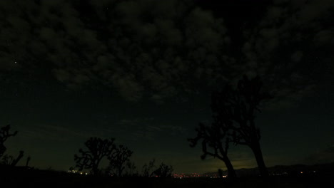 amazing all night holy grail time lapse of the mojave desert sky with the moon setting and sunrise