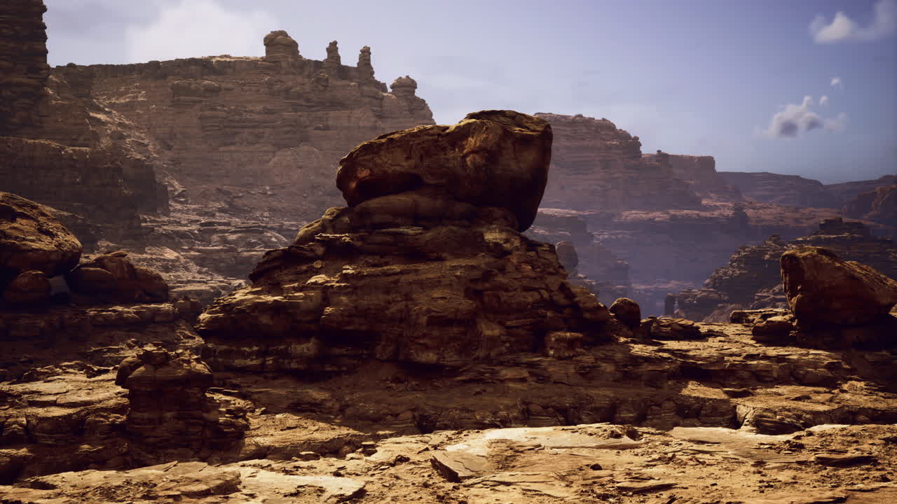 Stunning rock formations under a bright sky in a desert canyon setting