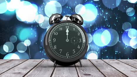 alarm clock counting down to midnight for new year
