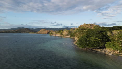 drone flying through the beautiful shoreline of lombok island in west nusa tenggara province, indonesia