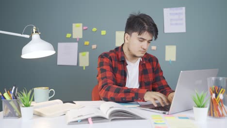 male student receiving bad news on the phone.