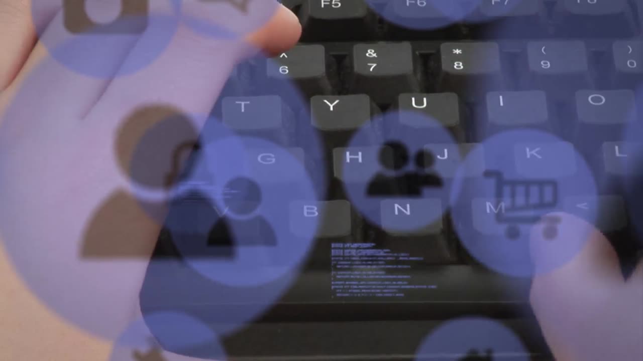 키보드에 타이핑하는 백인 남성 위의 기술 아이콘의 애니메이션