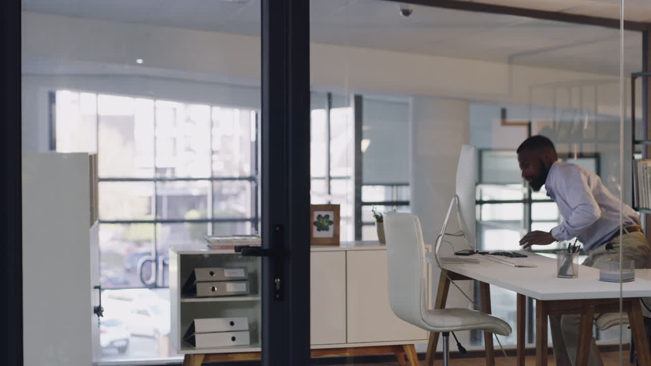 Businessman Walking in Modern Office