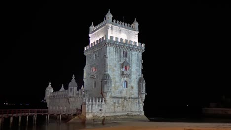 illuminated belém tower at night, unesco world heritage in lisbon, portugal