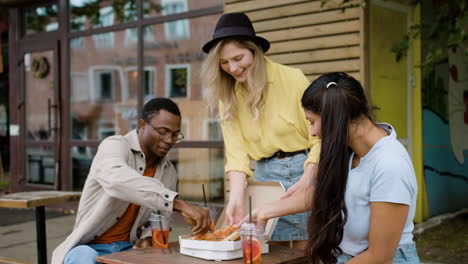 hungry people enjoying time together on the street