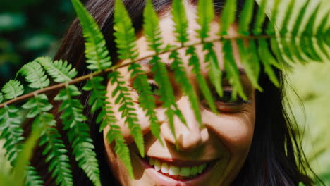 a woman surrounded by ferns