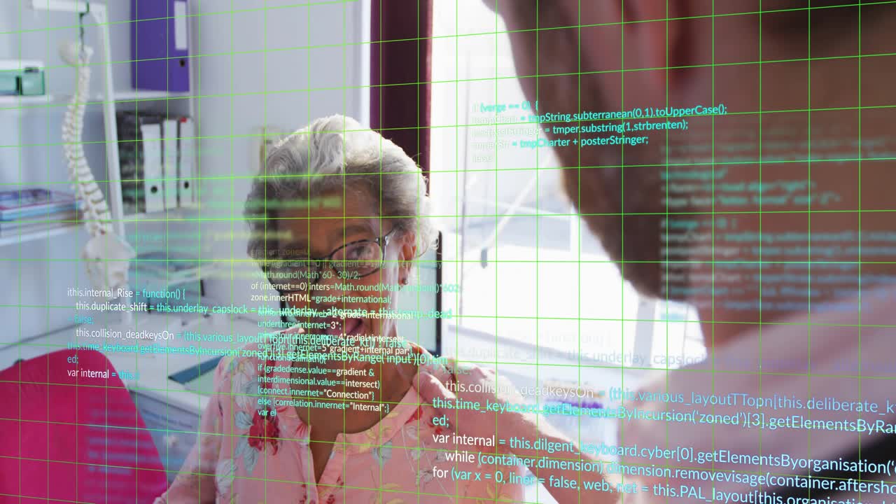 Medical practitioner placing hand on shoulder showing digital grid patient nodding smiling relieved