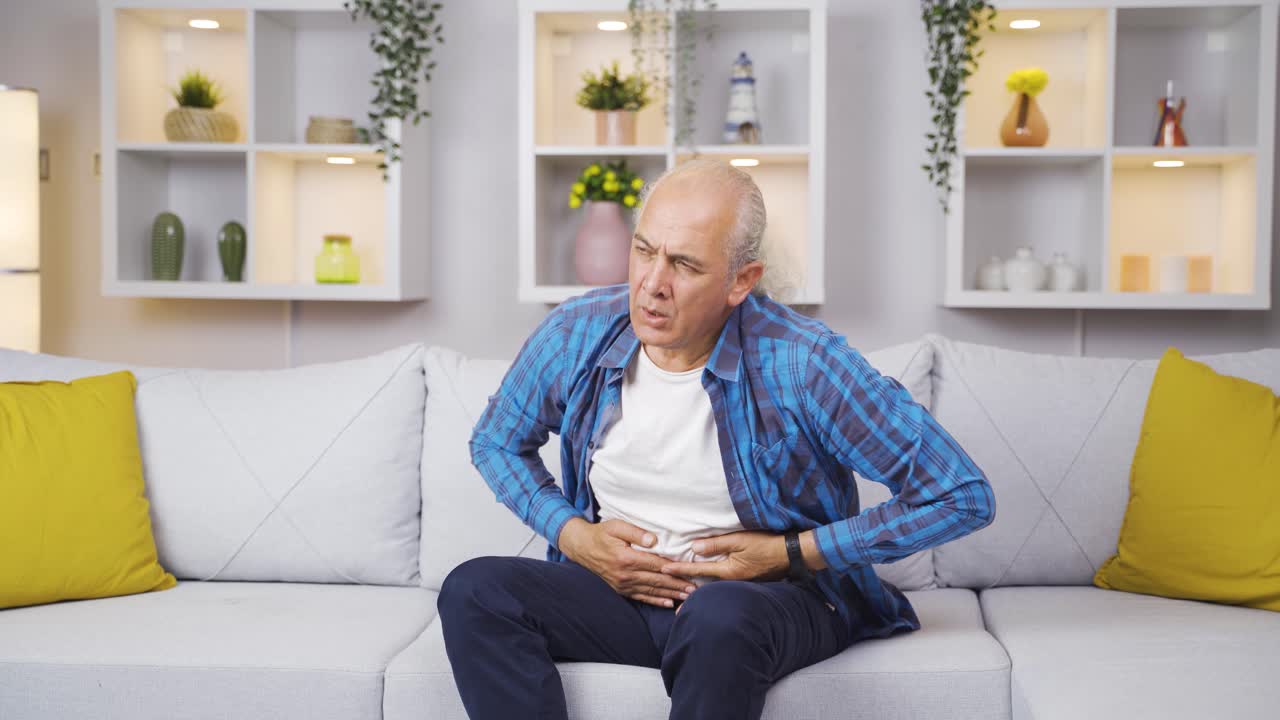 Old man with stomachache.