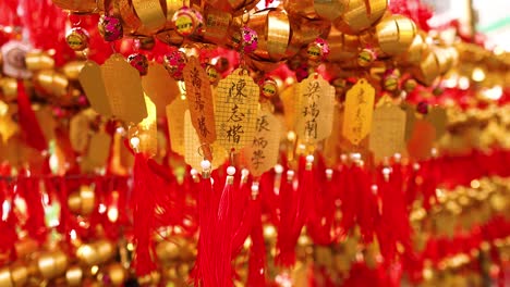 hanging golden bells with red tassels in hong kong