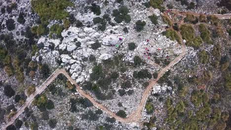aerial view of hikers on a mountain trail