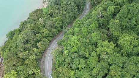 Aerial-shot-of-Road-around-Pasir-Tengkorak-beach,-Langkawi,-Malaysia