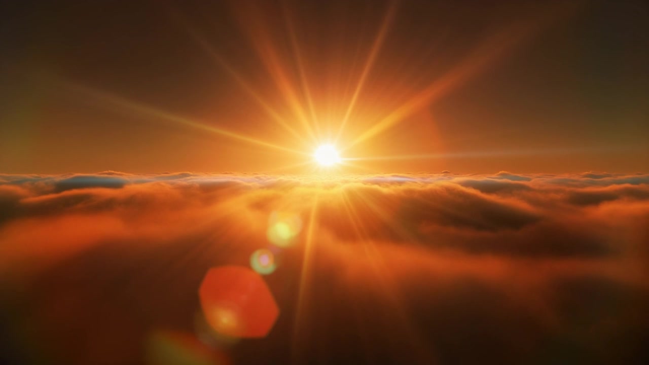 Aerial View of Golden Sunset Above Clouds