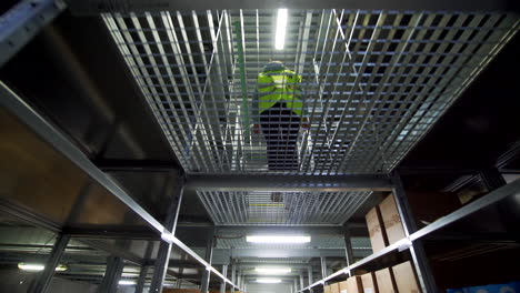 warehouse worker on elevated platform