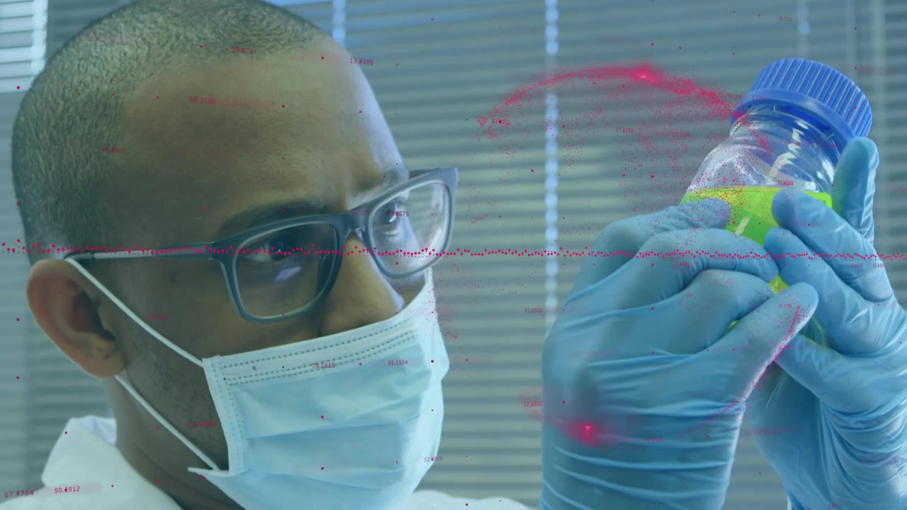 Scientist Examining a Chemical Sample in a Laboratory