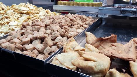 walking around looking at the fast food, street food stalls at the market place in india