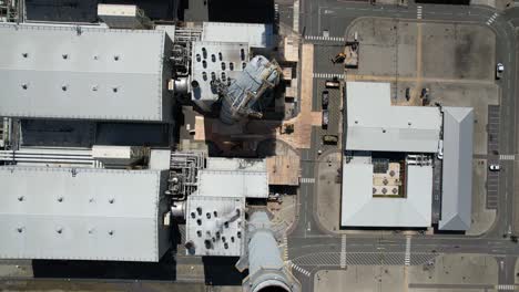 Drone-overhead-view-looking-down-damaged-chimney-stacks-Grain-CHP-Power-station-Kent-UK