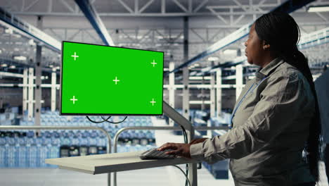 software developer in server hub using chroma key workstation