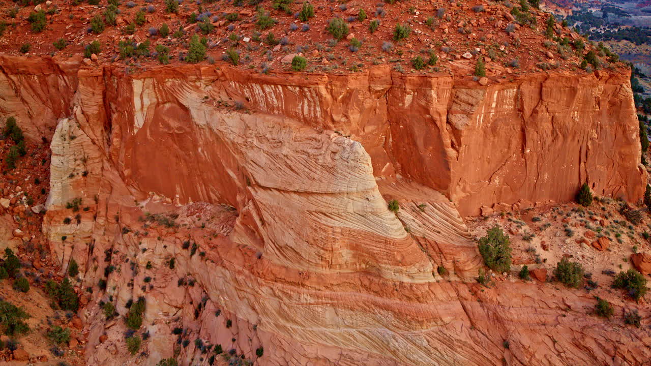 The camera ascends, unveiling the raw grandeur of the Southwest’s labyrinthine canyonlands.